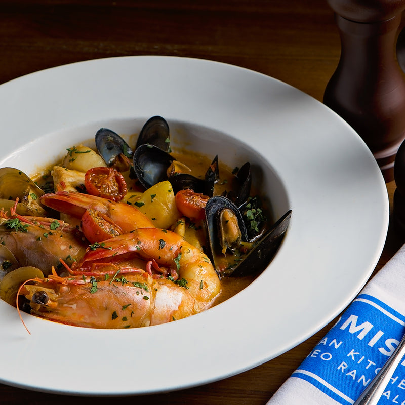 products/Fishstewoftigerprawn_seabass_scallops_mussels_saffron_potatoesandparsley_lo-res.jpg